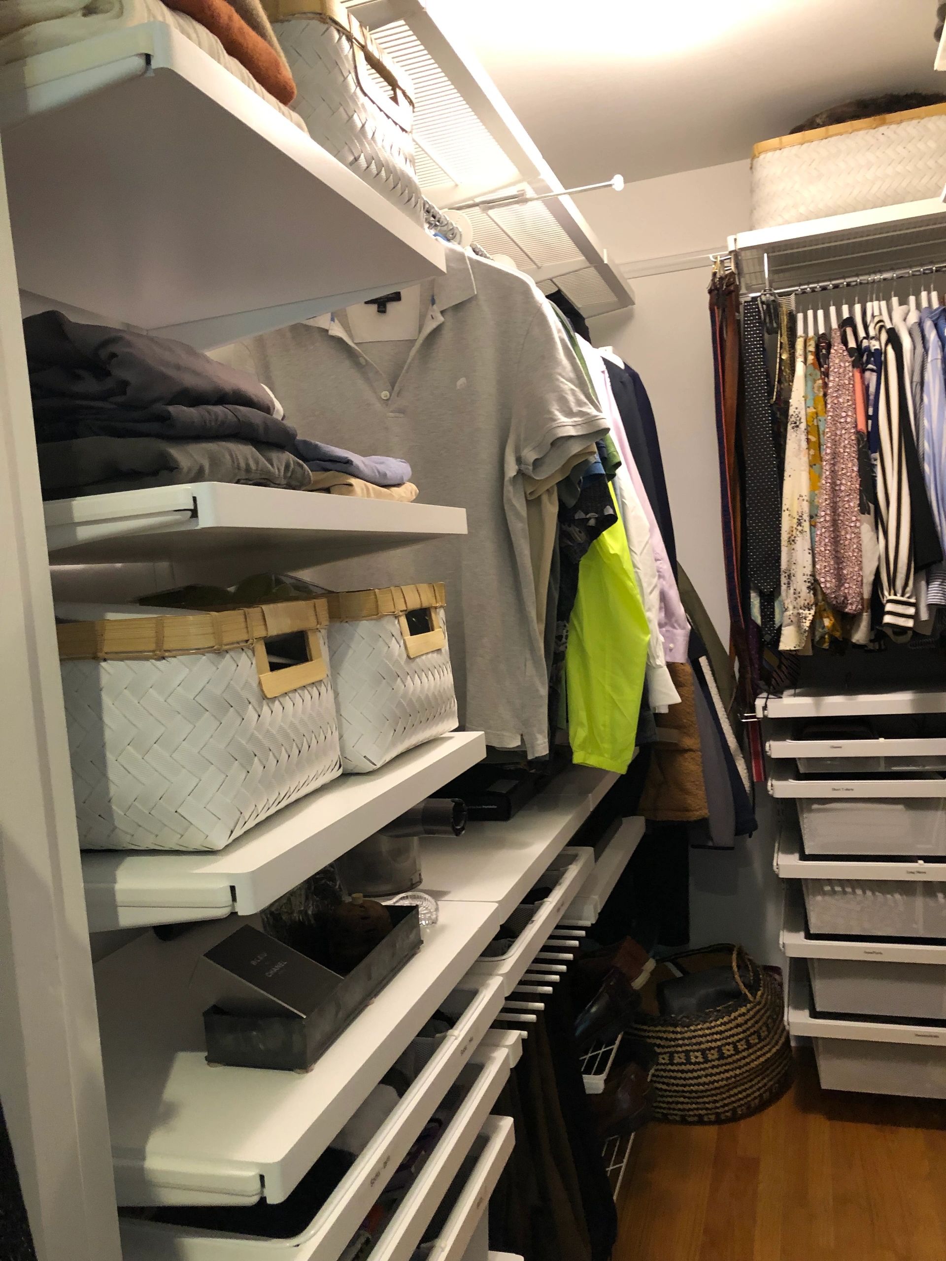 Calm, organized walk-in closet with storage